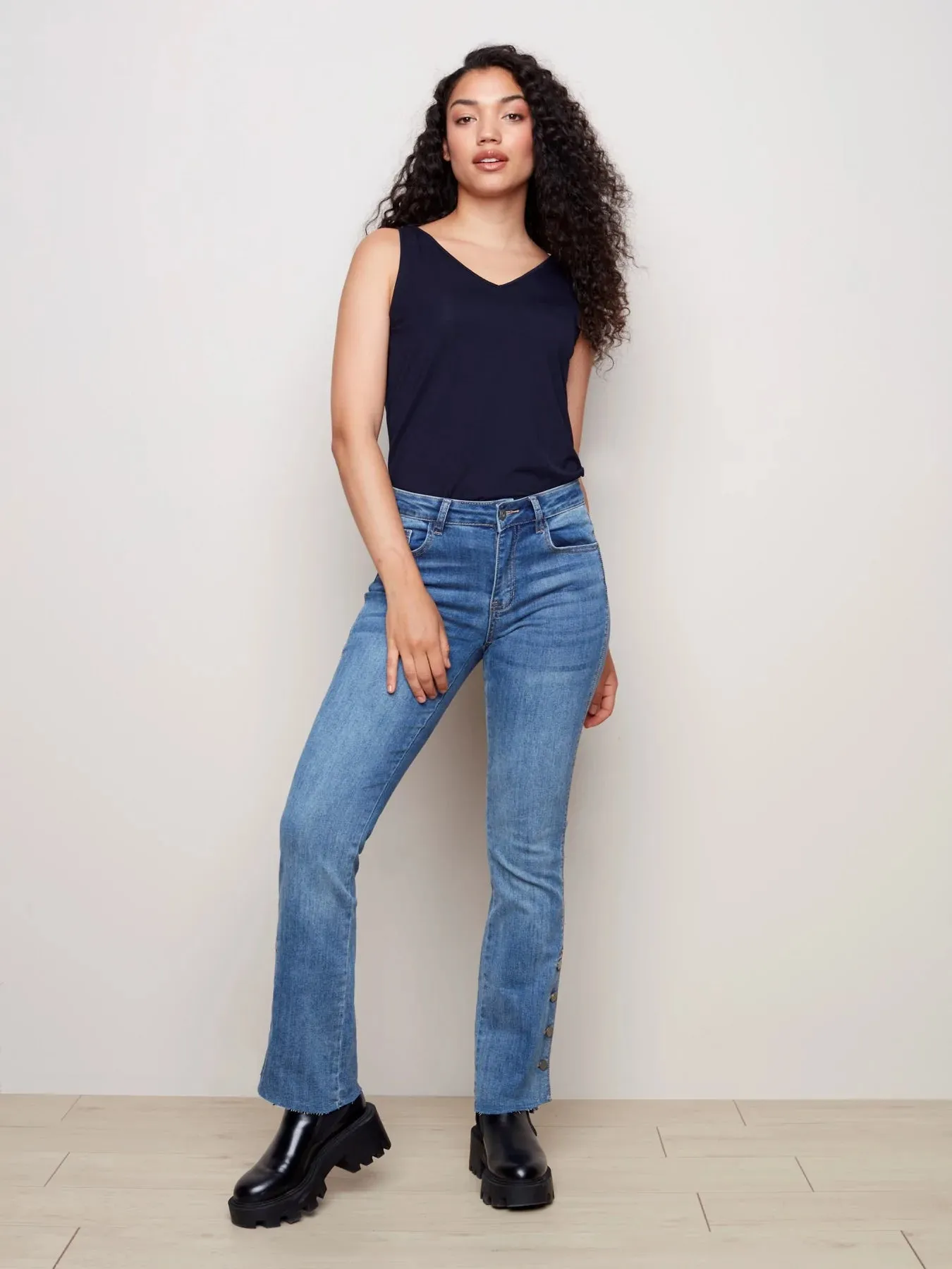 FLARE JEANS WITH SIDE BUTTONS