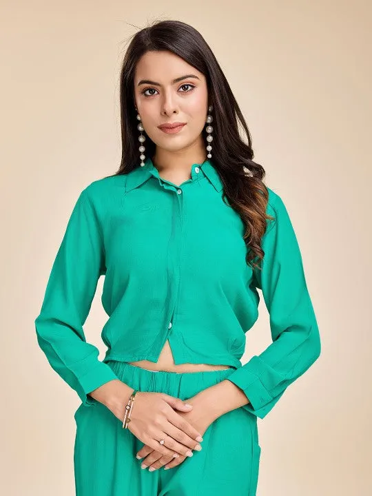 stylish crop shirt with long puffed cuff sleeves, back cutout tie-up &  pants set in Moroccan Crepe - Green